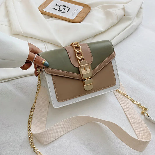 Luxury handbag with shoulder strap